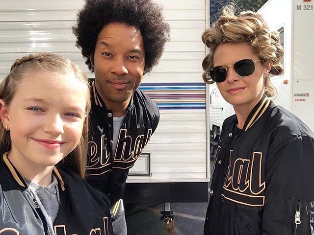 Celebrities In Matching Black And Gold Varsity Jackets