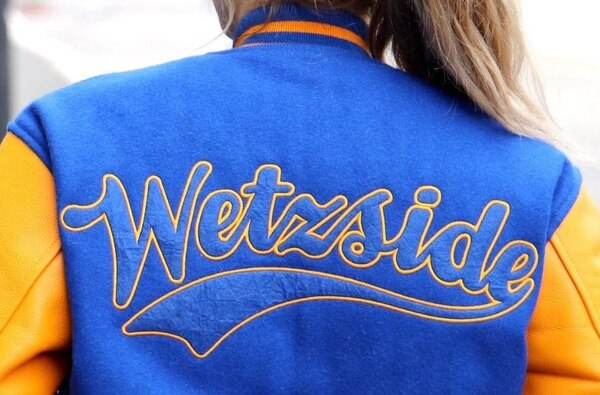 Wetzels pretzels royal blue and gold custom wool and leather garment with wetzside script back design