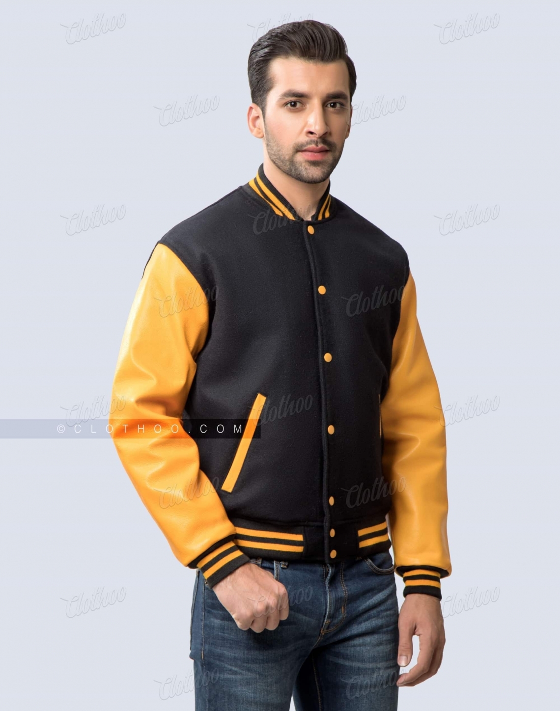 Black and gold varsity jacket in melton wool and cowhide leather sleeves side pose men