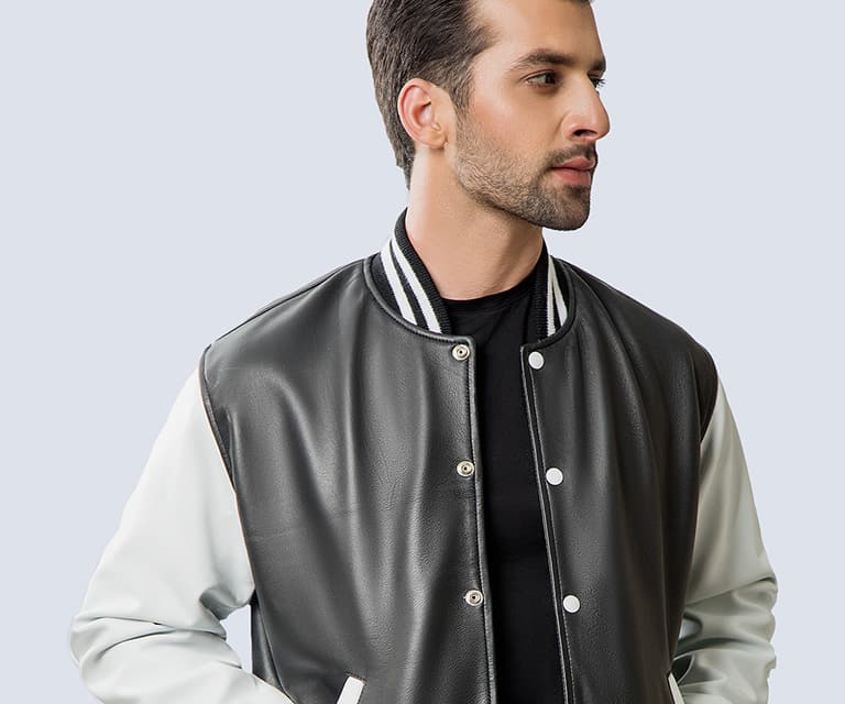  Black leather body and white sleeves with contrasting collar, cuff and hem. 