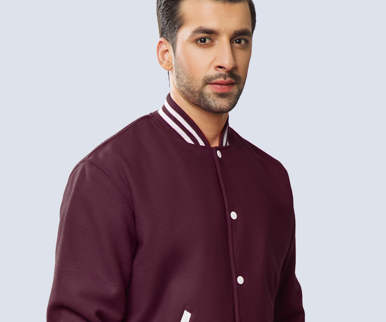  Maroon all-wool body with striped knit collar and cuffs. 